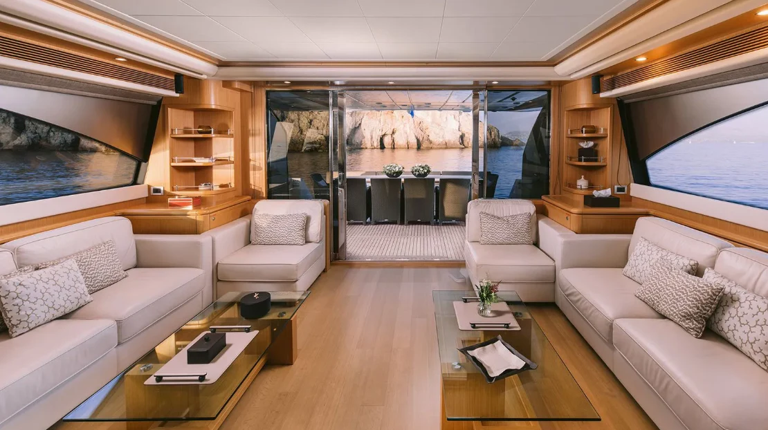 a living room with a large window aboard MELI Yacht for Charter