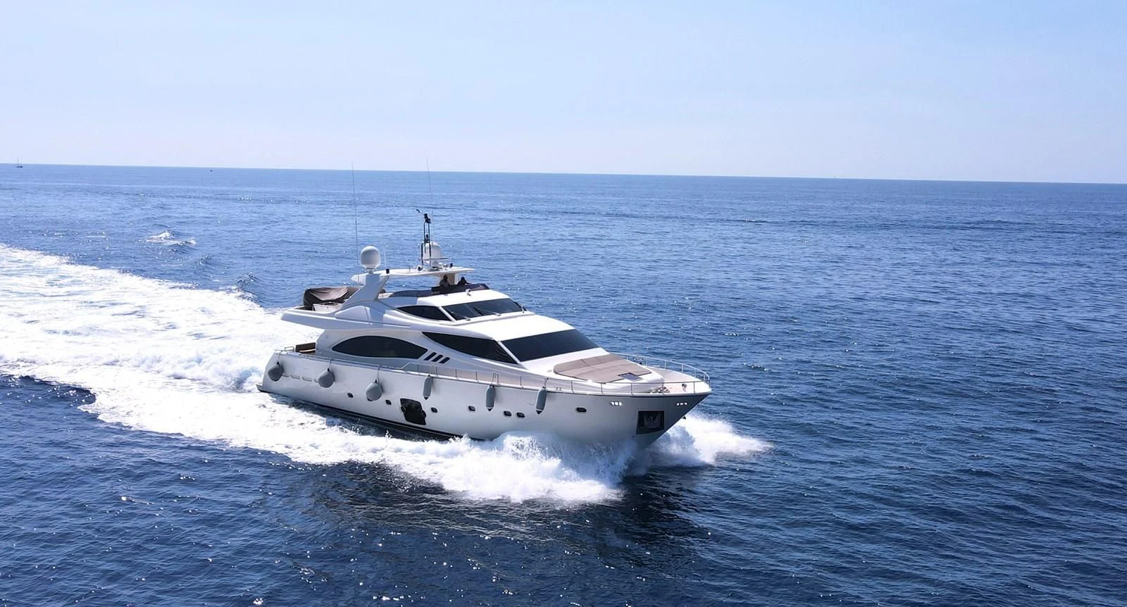 a white yacht on the water aboard MELI Yacht for Charter