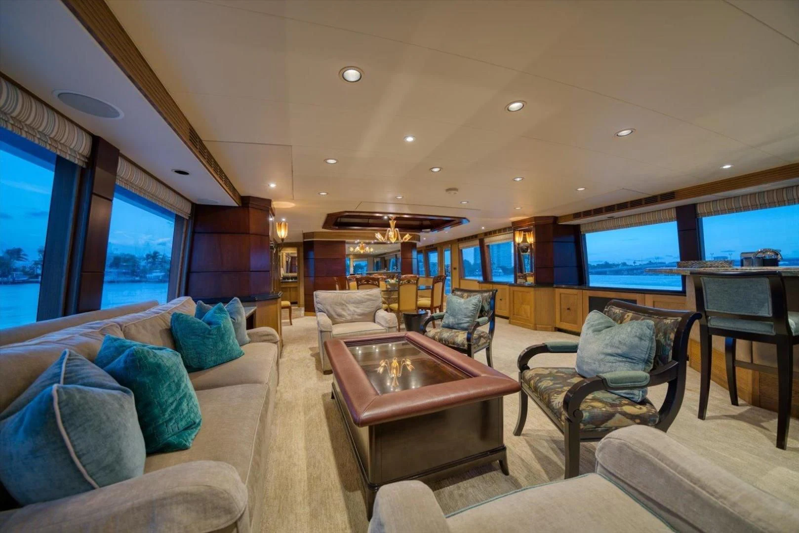 a living room with a large window aboard NORTH COAST 120 Yacht for Sale