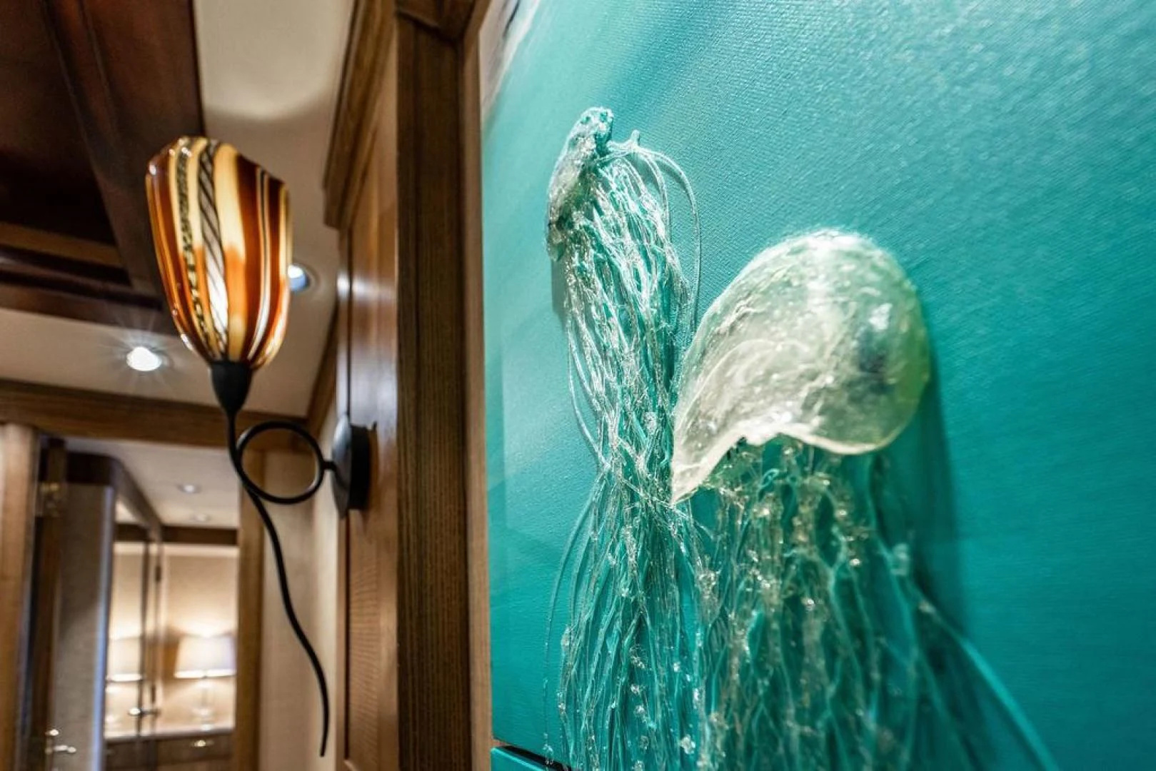 a green and white dinosaur aboard NORTH COAST 120 Yacht for Sale