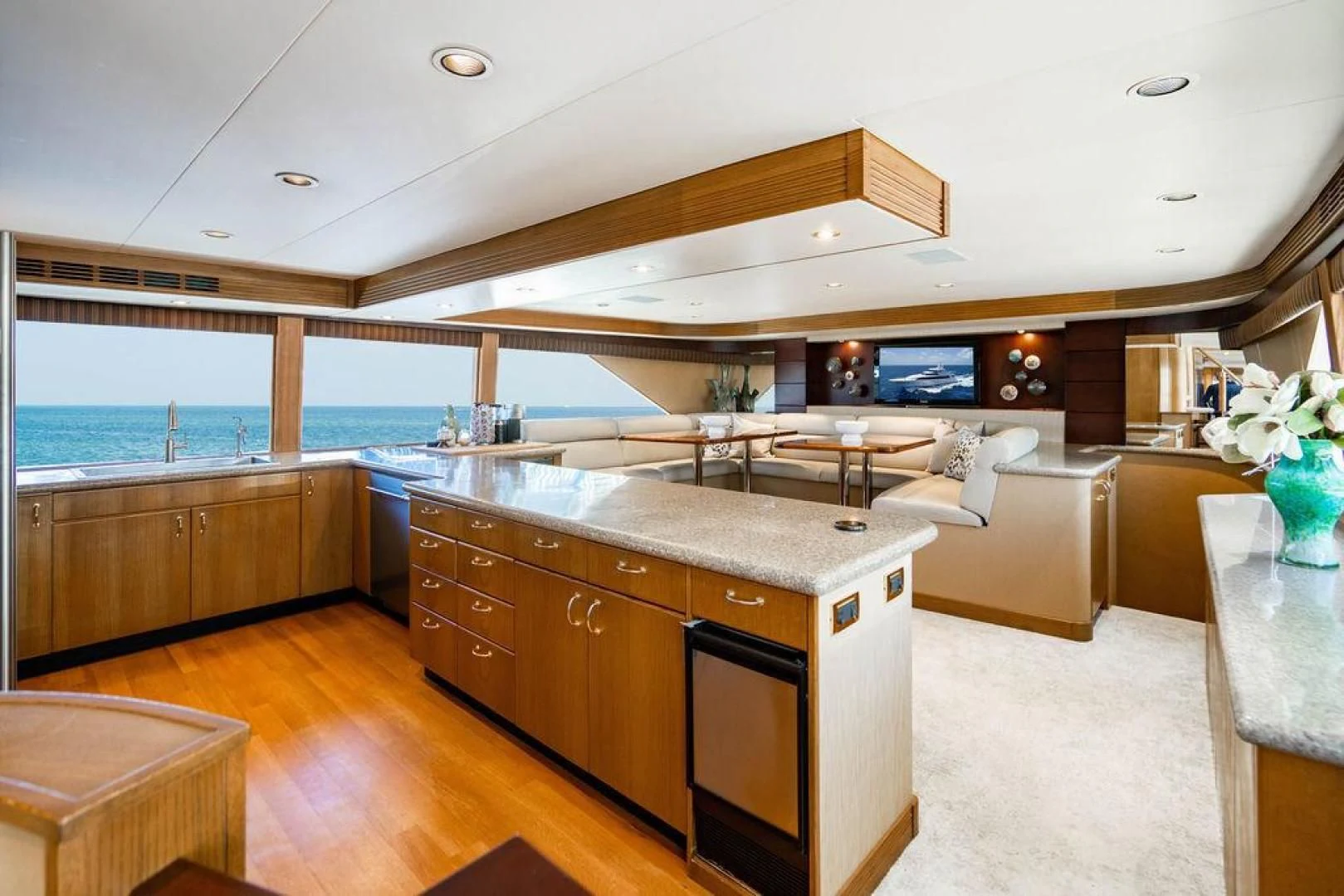 a kitchen with a large island aboard NORTH COAST 120 Yacht for Sale