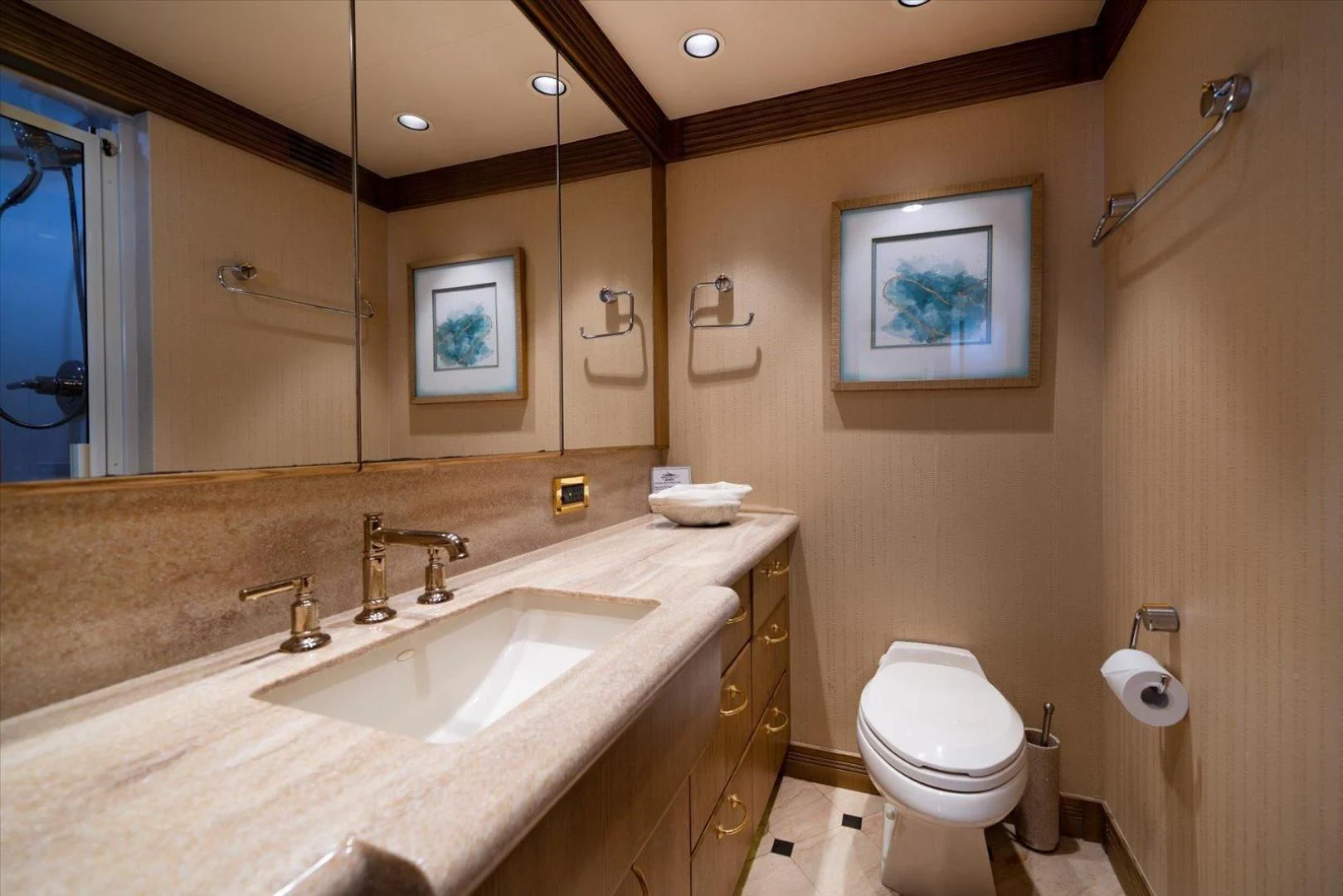 a bathroom with a sink and toilet aboard NORTH COAST 120 Yacht for Sale