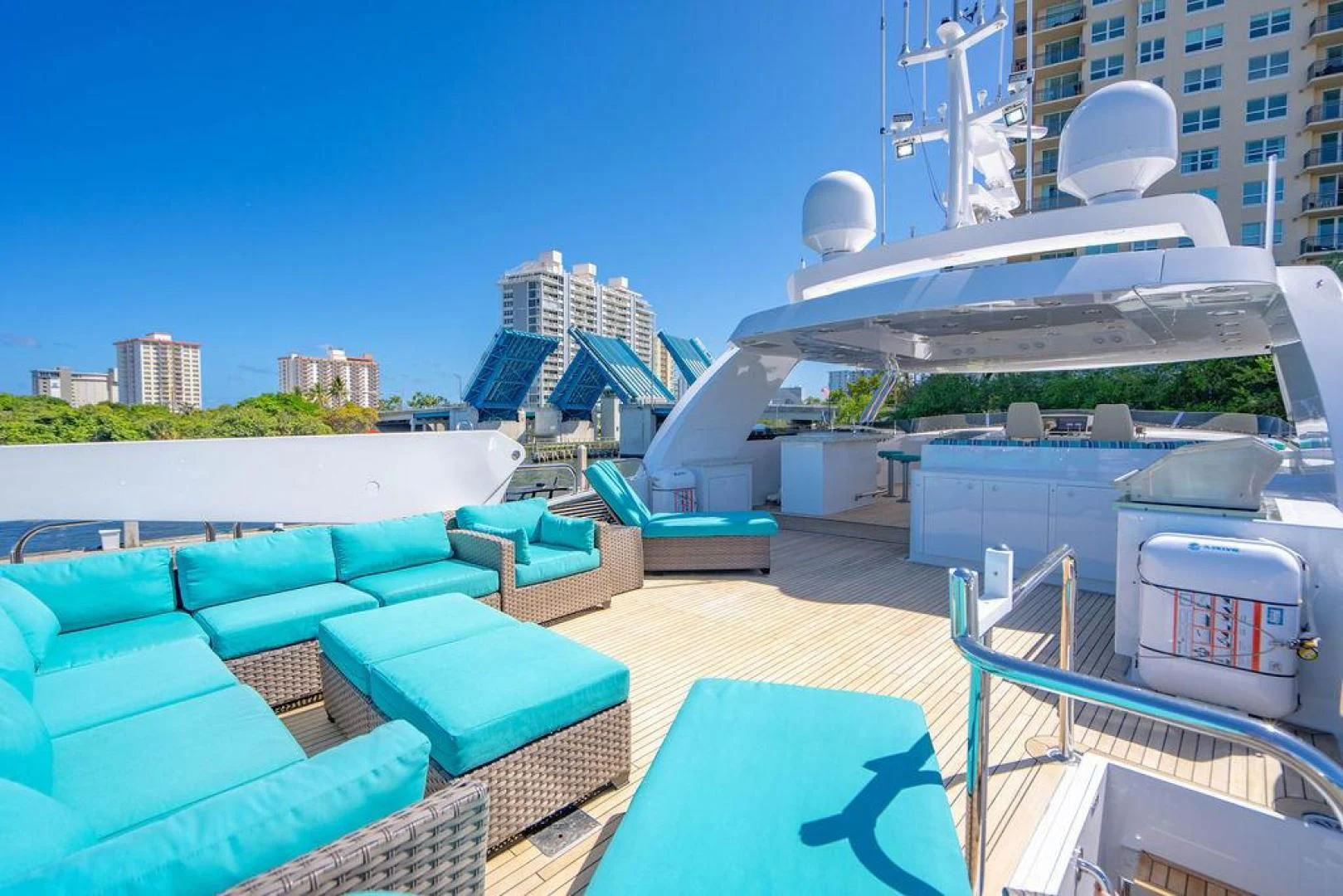 a large white boat on a deck aboard NORTH COAST 120 Yacht for Sale