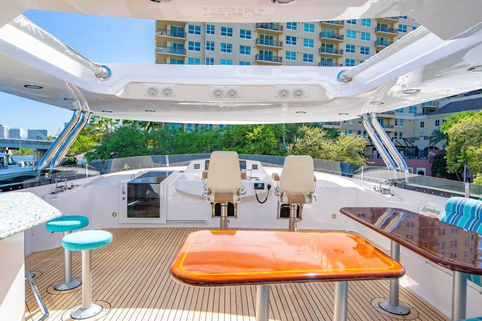 a boat with chairs and tables aboard NORTH COAST 120 Yacht for Sale