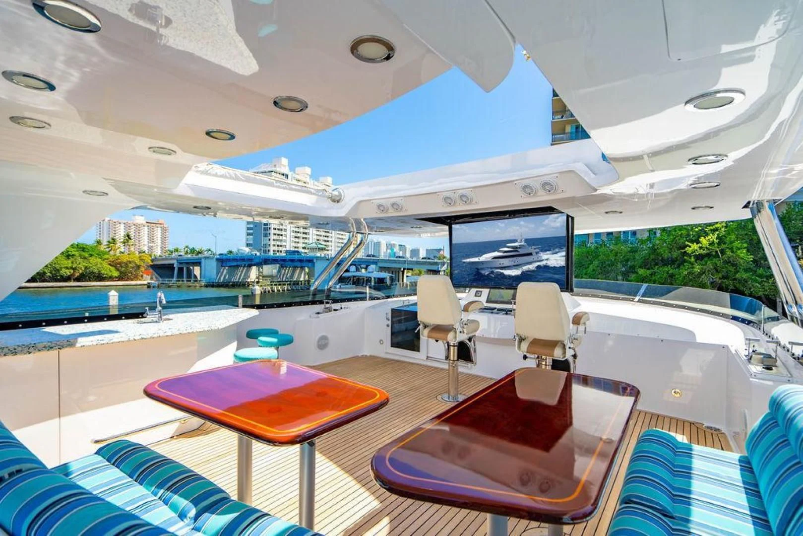 a room with a pool and a large screen aboard NORTH COAST 120 Yacht for Sale
