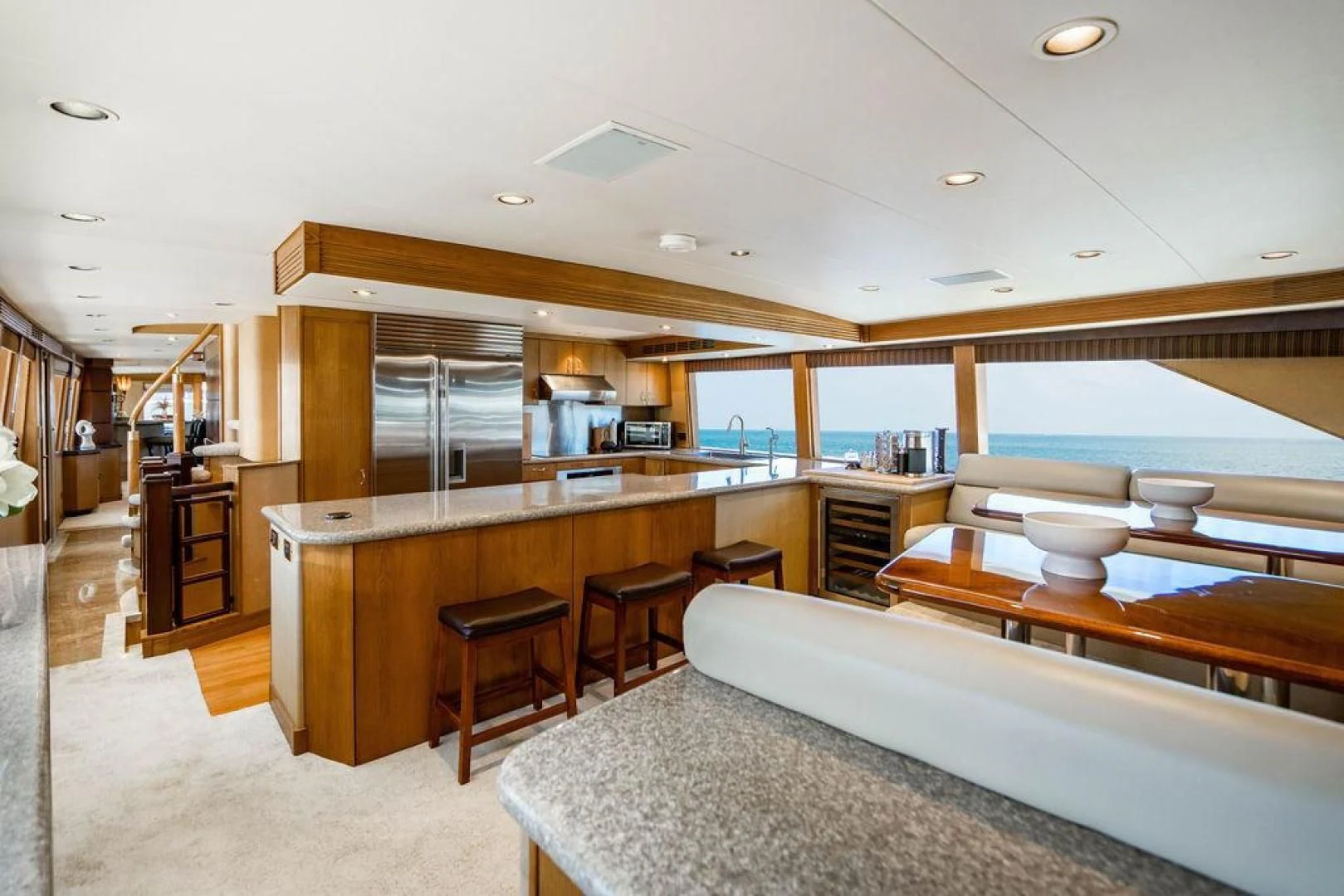 a large kitchen with a large window aboard NORTH COAST 120 Yacht for Sale