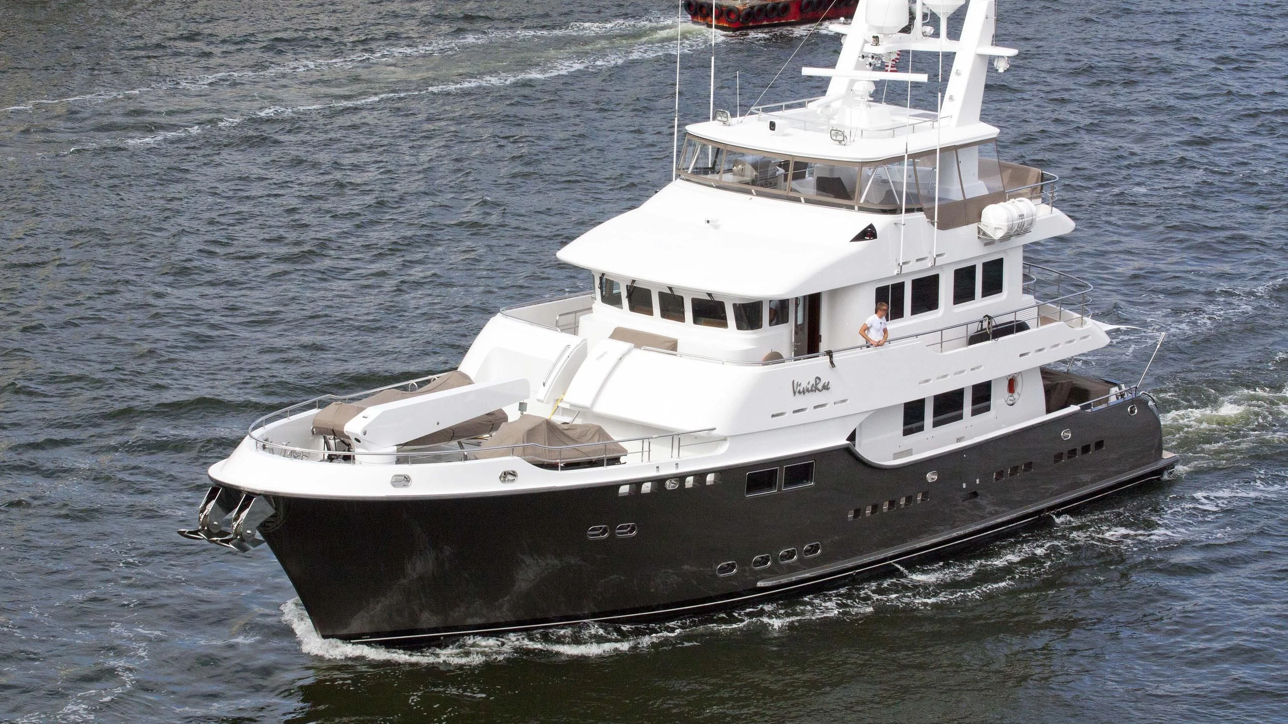 a large white boat in the water aboard VEGA Yacht for Sale