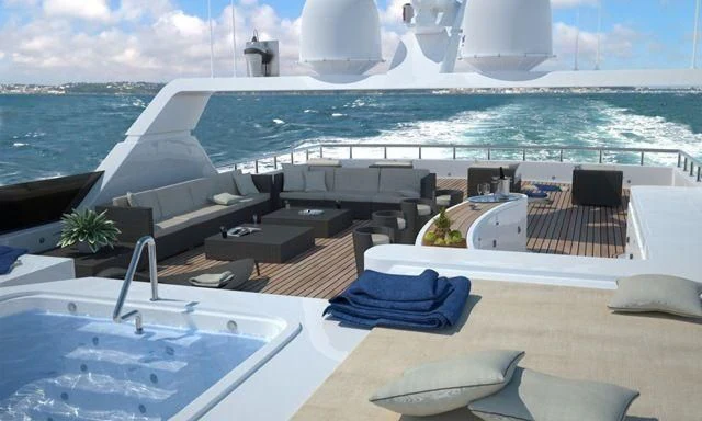 a pool with a deck and chairs aboard CROCUS Yacht for Sale