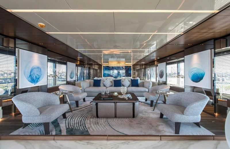 a living room with a large window aboard CROCUS Yacht for Sale