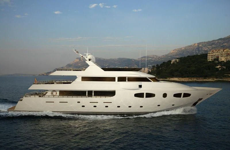 a large white yacht in the water aboard CROCUS Yacht for Sale