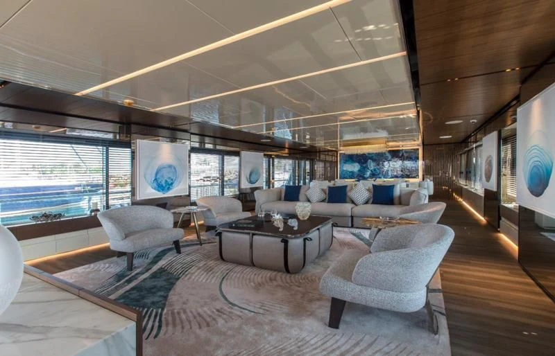a large living room with a large window aboard CROCUS Yacht for Sale