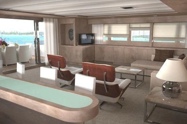 a room with a couch and a pool table aboard CROCUS Yacht for Sale