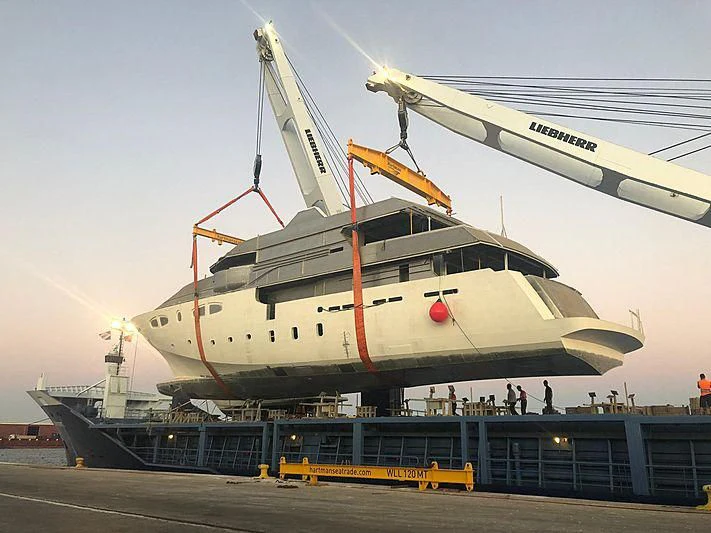 a large white ship docked aboard CROCUS Yacht for Sale