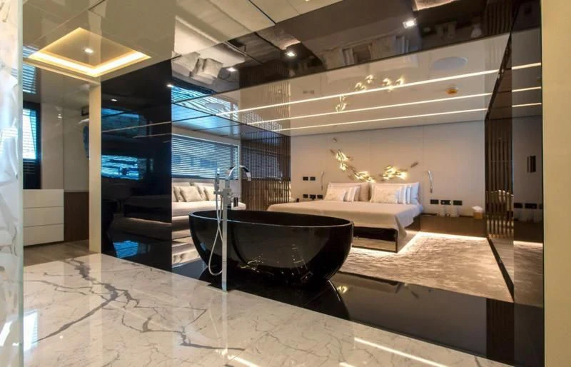 a large room with a large jacuzzi aboard CROCUS Yacht for Sale