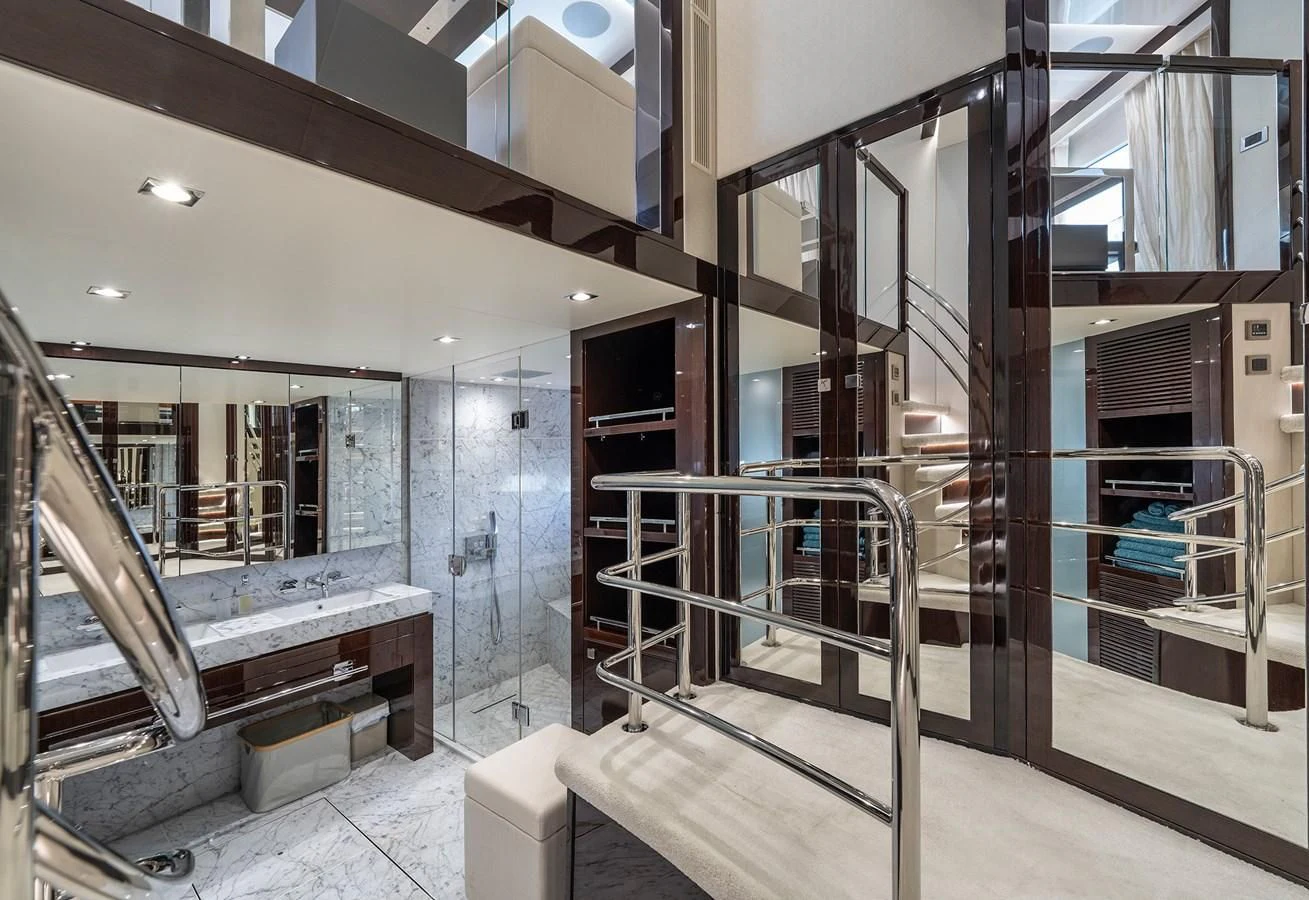 a room with a staircase and a staircase aboard LADY M Yacht for Sale