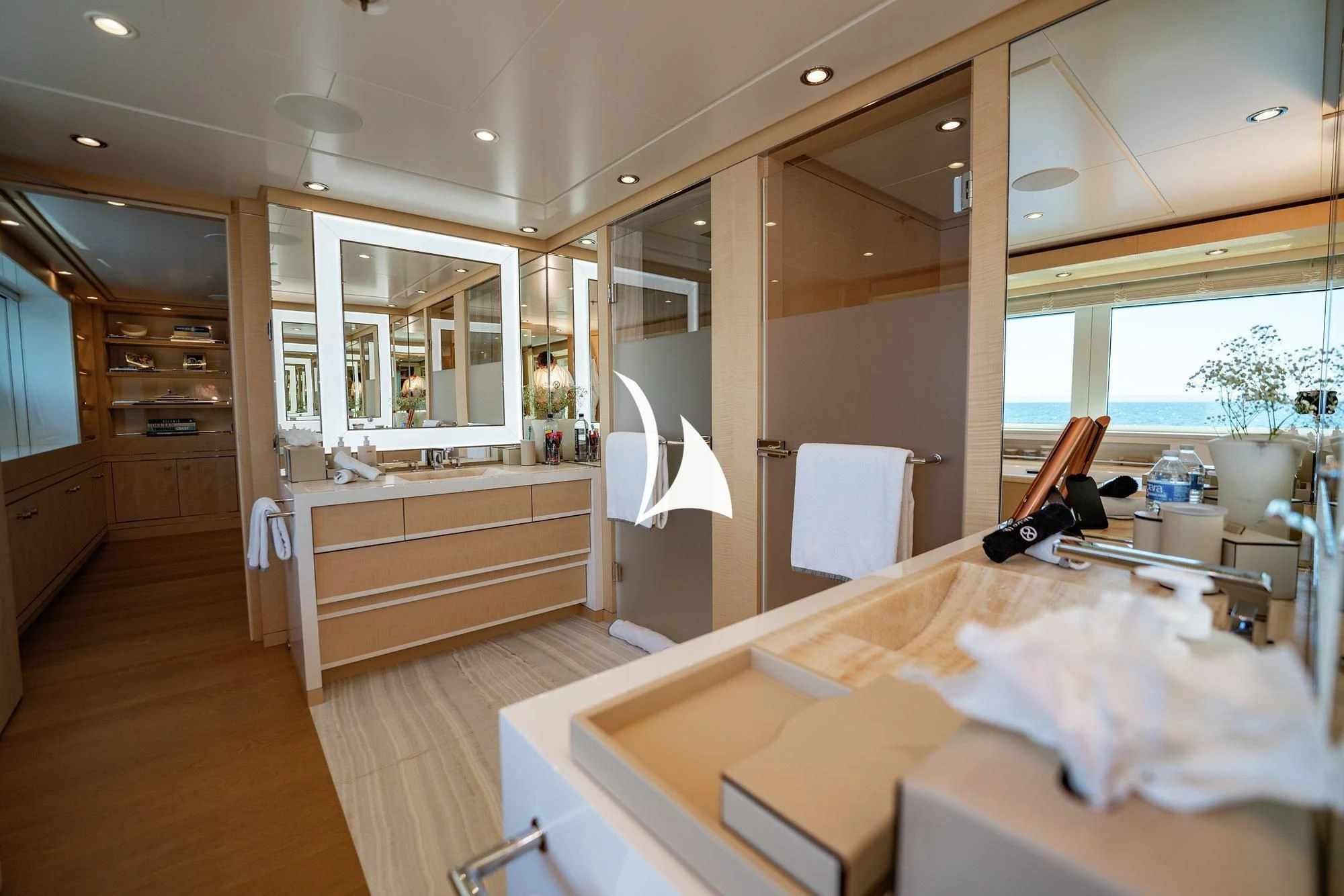 a bathroom with a large bathtub aboard NOMAD Yacht for Sale