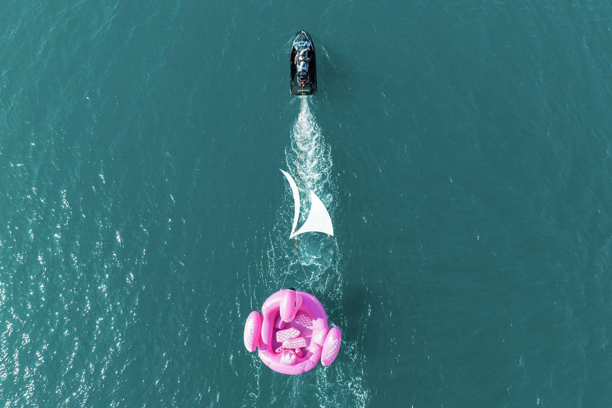 a person's head in the water aboard NOMAD Yacht for Sale