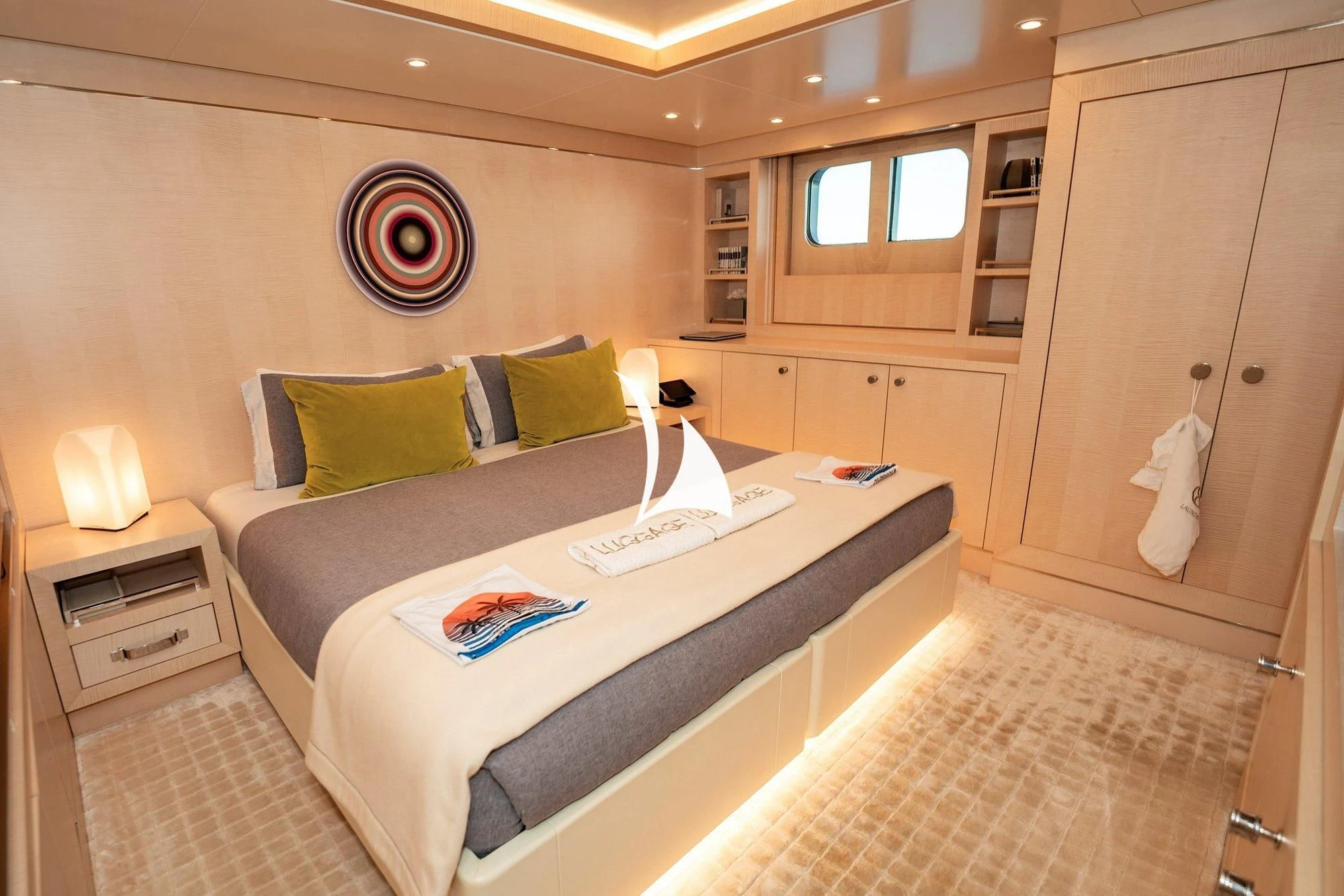 a bed in a room aboard NOMAD Yacht for Sale