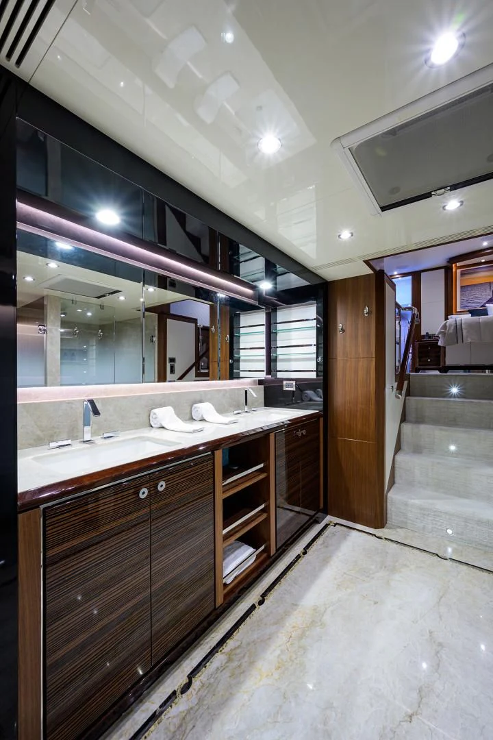 a bathroom with a large mirror aboard ZEPHYR Yacht for Charter