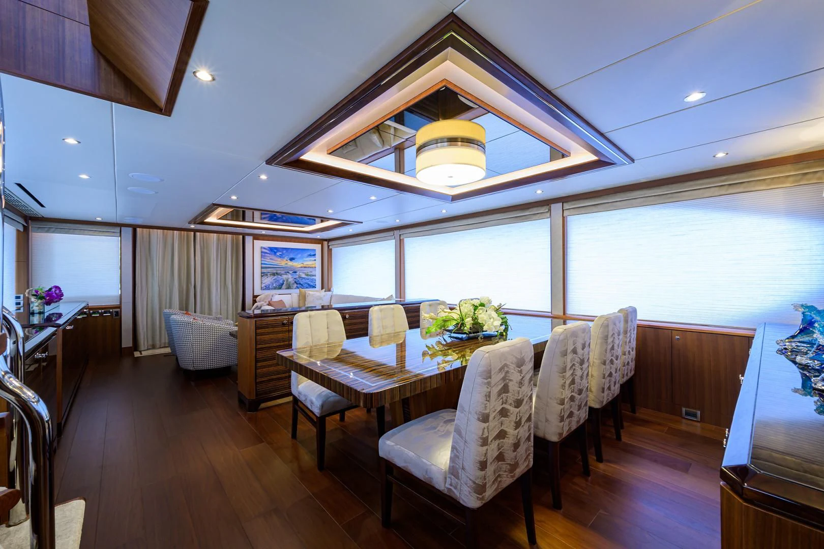 a dining room with a table and chairs aboard ZEPHYR Yacht for Charter
