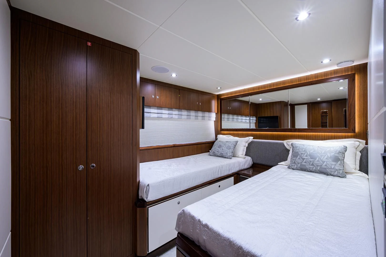 a room with two beds aboard ZEPHYR Yacht for Charter