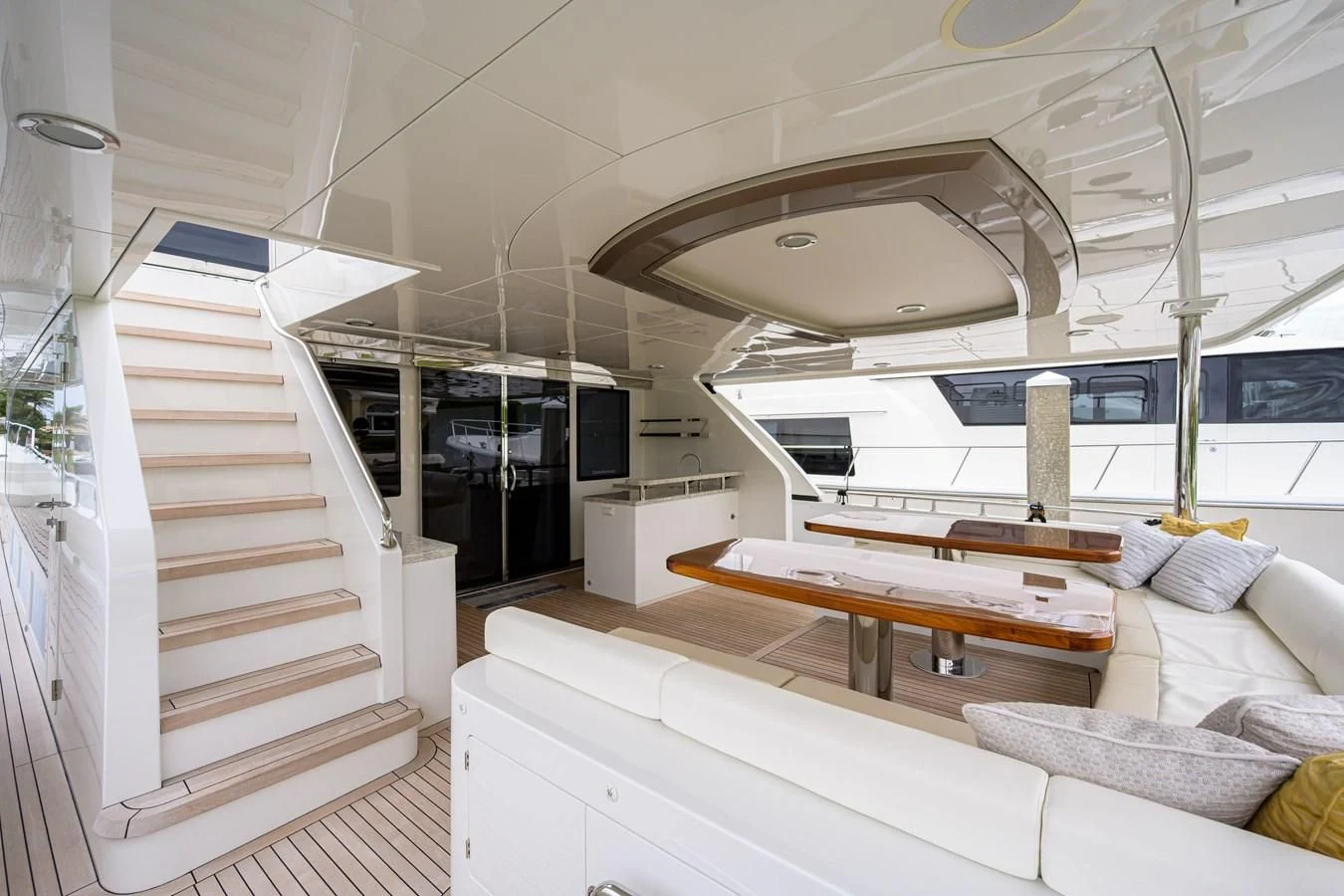 a room with a bed and a table aboard ZEPHYR Yacht for Charter