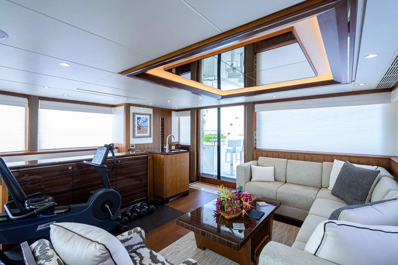 a living room with a couch and a table aboard ZEPHYR Yacht for Charter