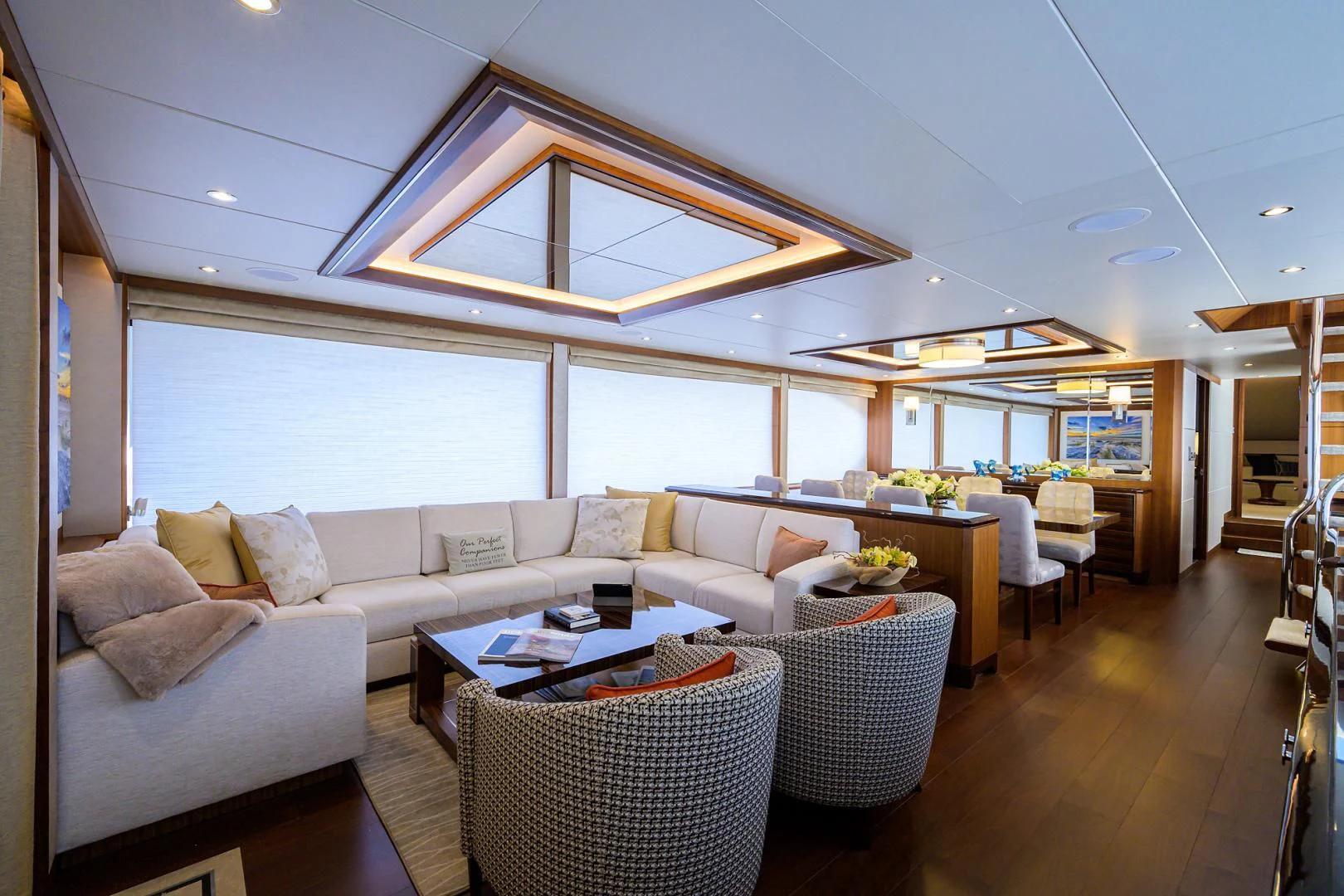 a living room with a large window aboard ZEPHYR Yacht for Charter