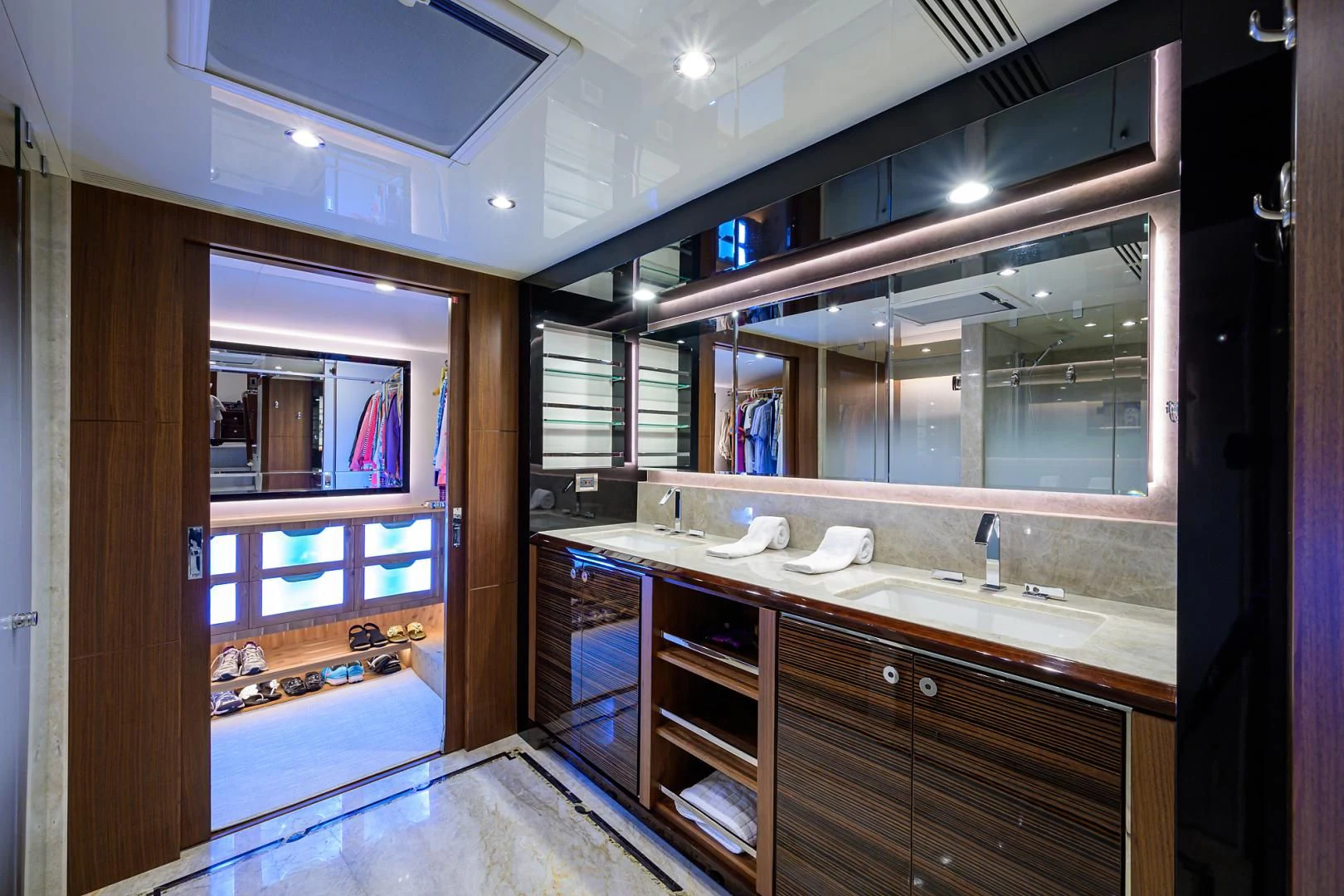 a bathroom with a large mirror aboard ZEPHYR Yacht for Charter
