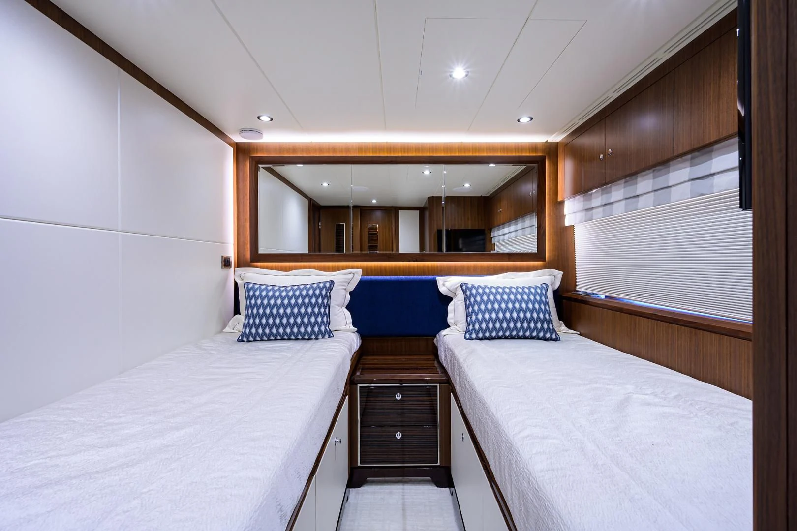 a room with two beds aboard ZEPHYR Yacht for Charter