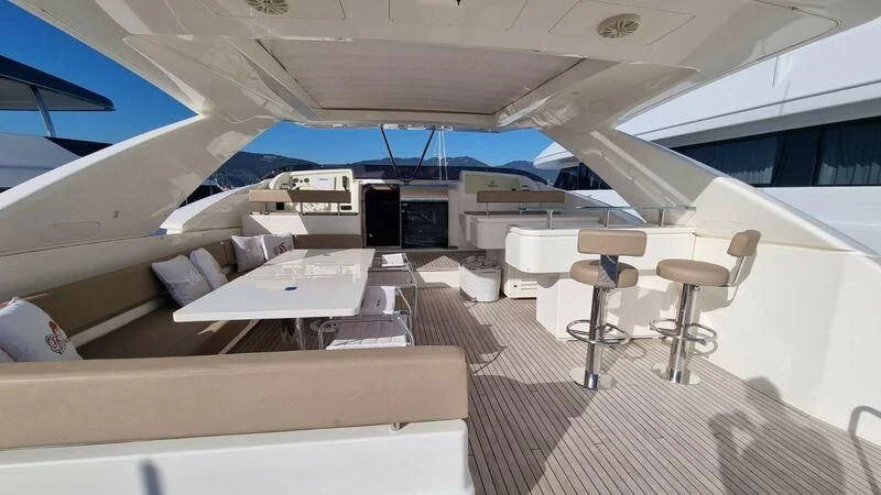 a plane with a desk and chairs aboard NENA Yacht for Sale