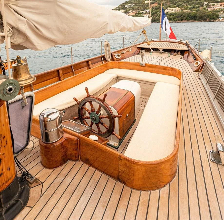 a boat with a wooden deck aboard MILENA Yacht for Sale
