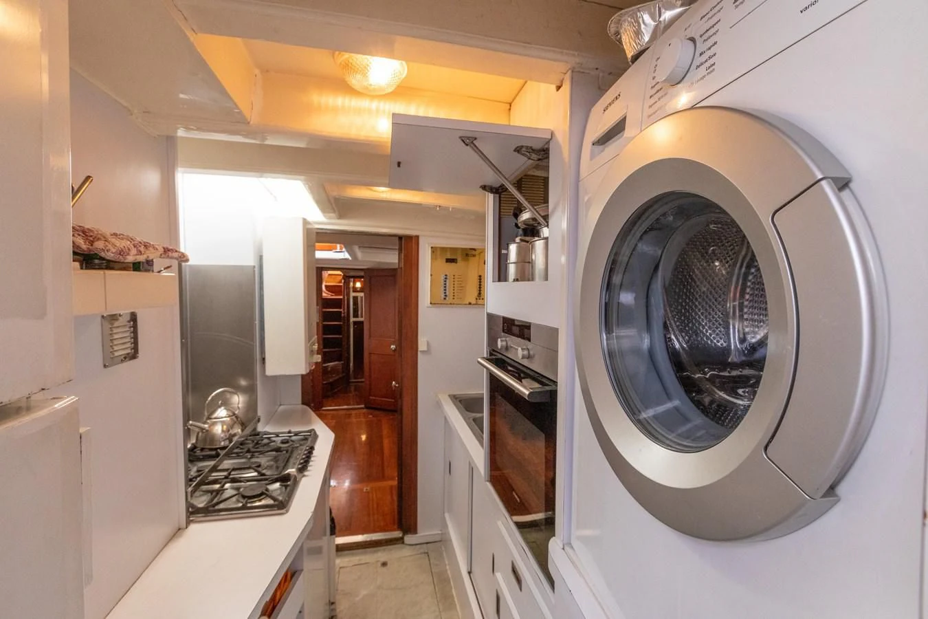 a laundry room with a washing machine aboard MILENA Yacht for Sale