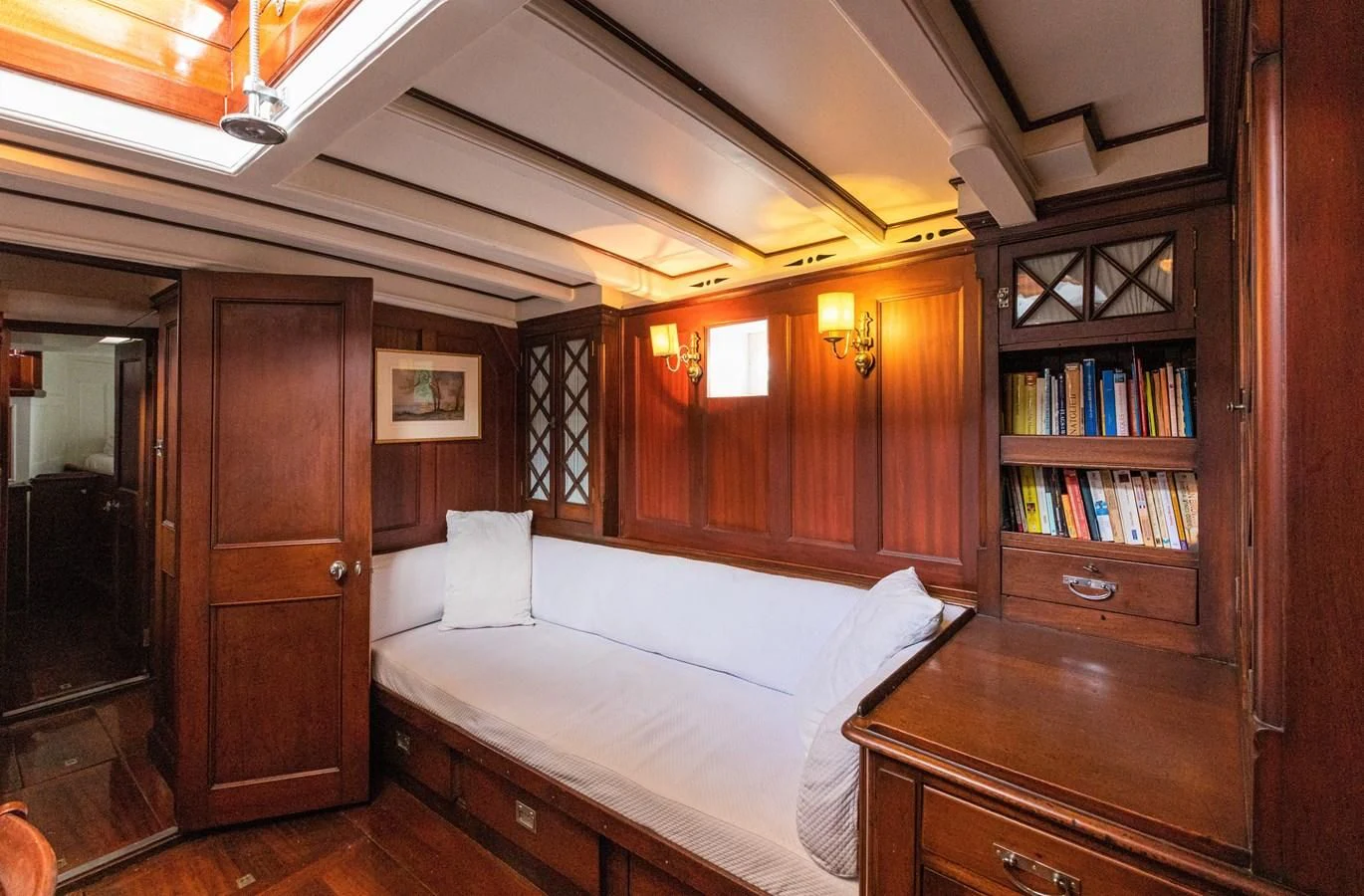 a bed in a room aboard MILENA Yacht for Sale