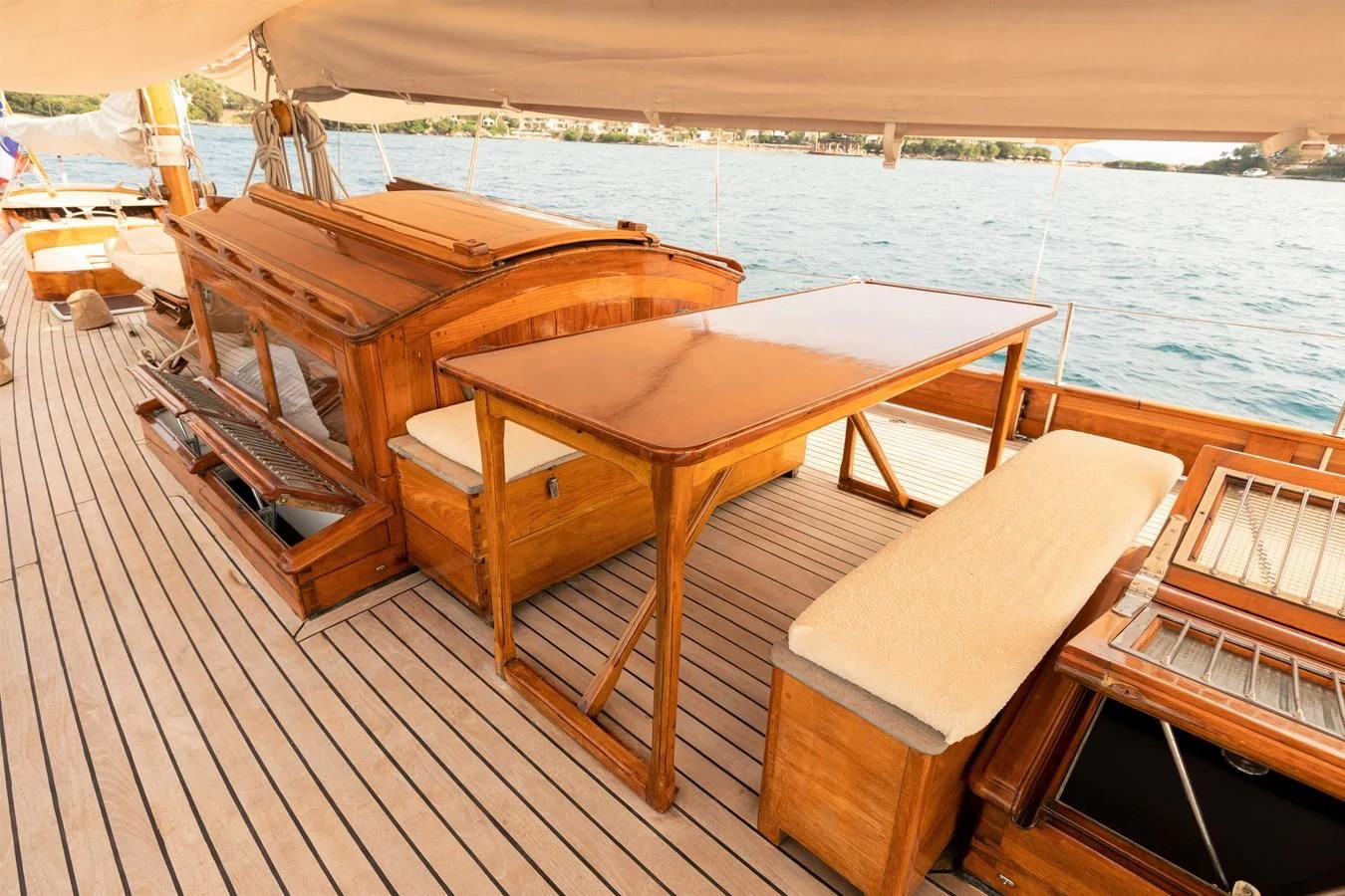 a table and chairs on a deck aboard MILENA Yacht for Sale