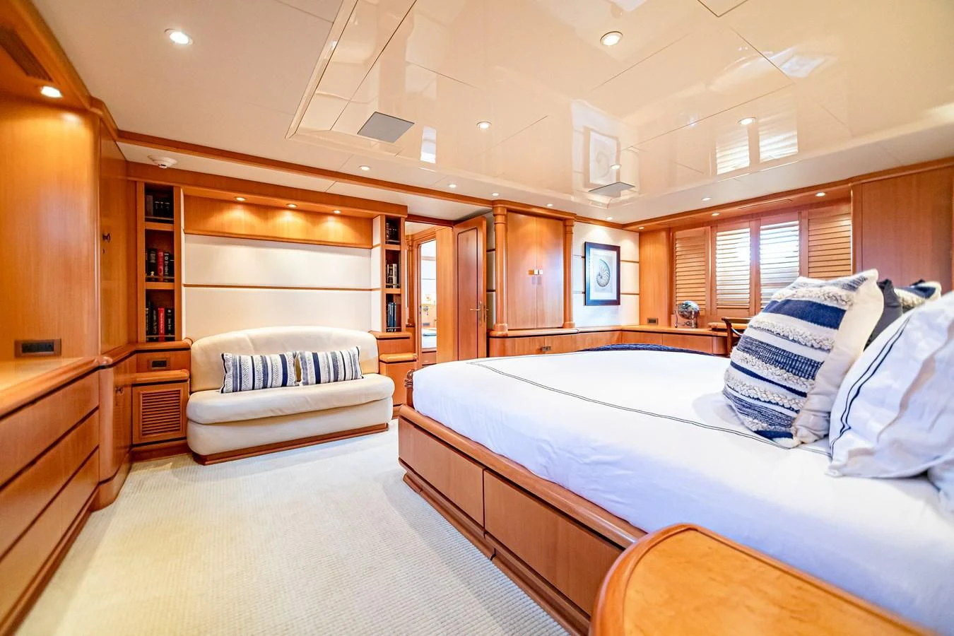 a room with a couple of beds aboard XOXO Yacht for Charter