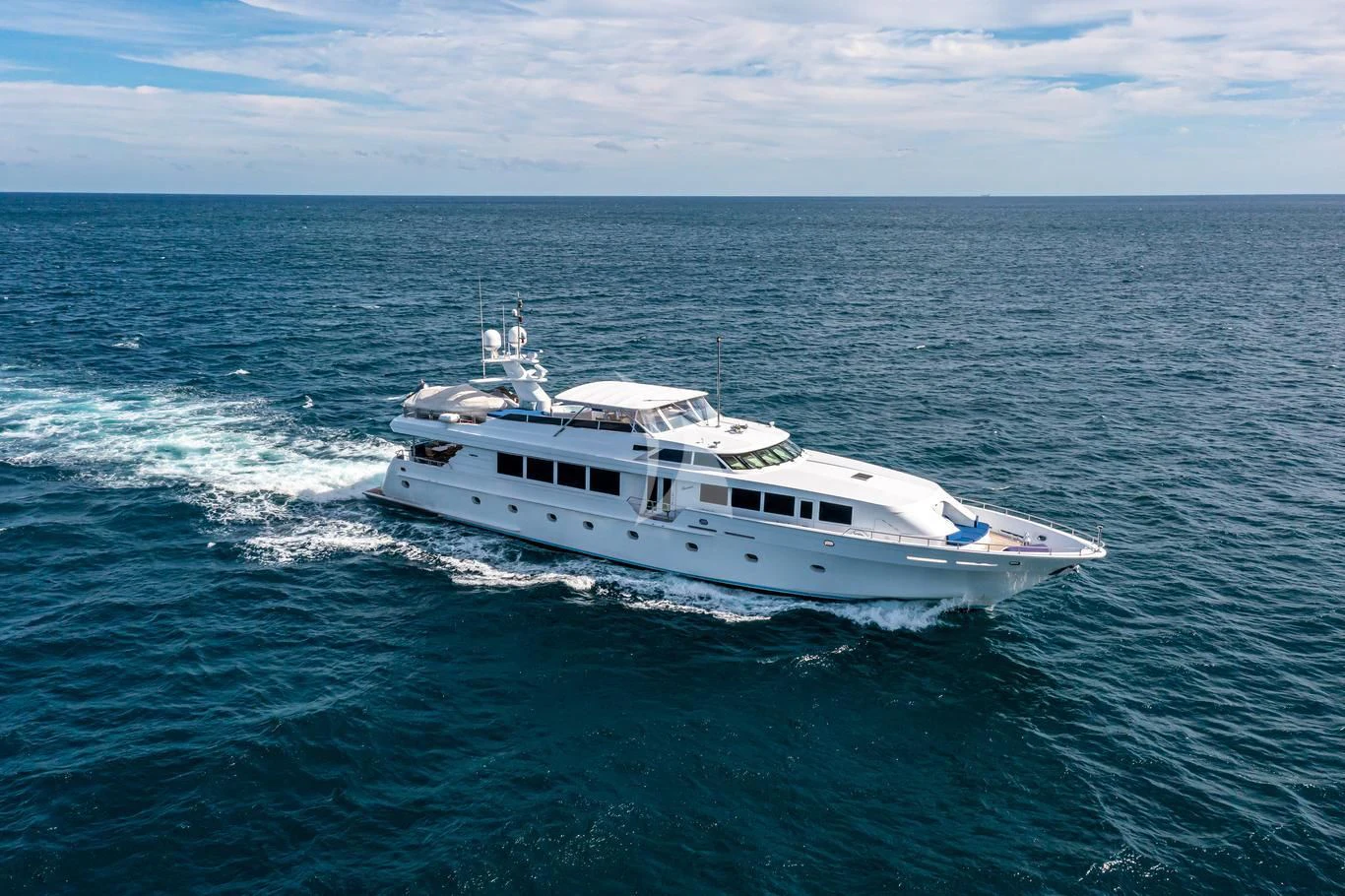 a white boat in the water aboard XOXO Yacht for Charter