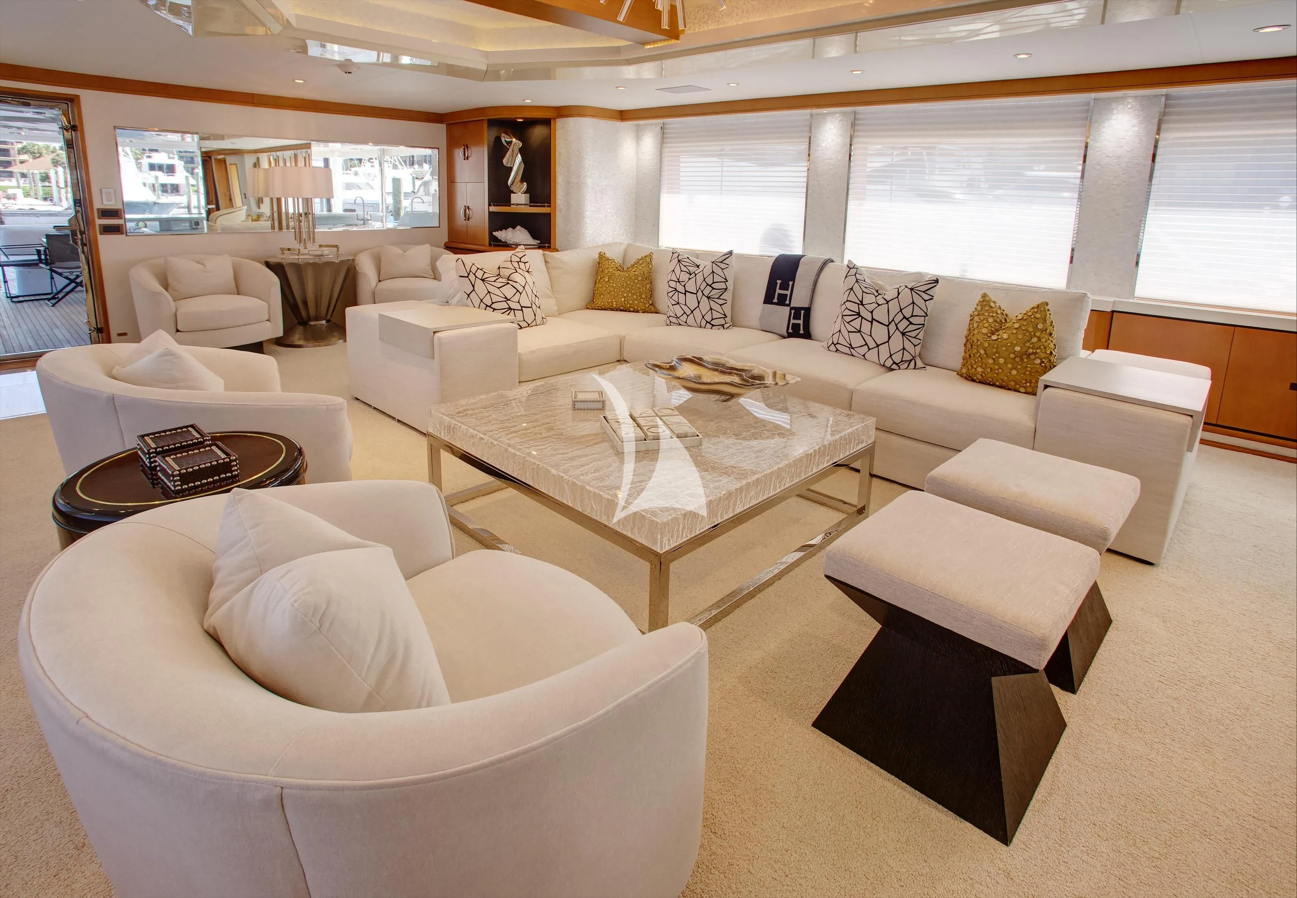 a living room with a large window aboard XOXO Yacht for Charter
