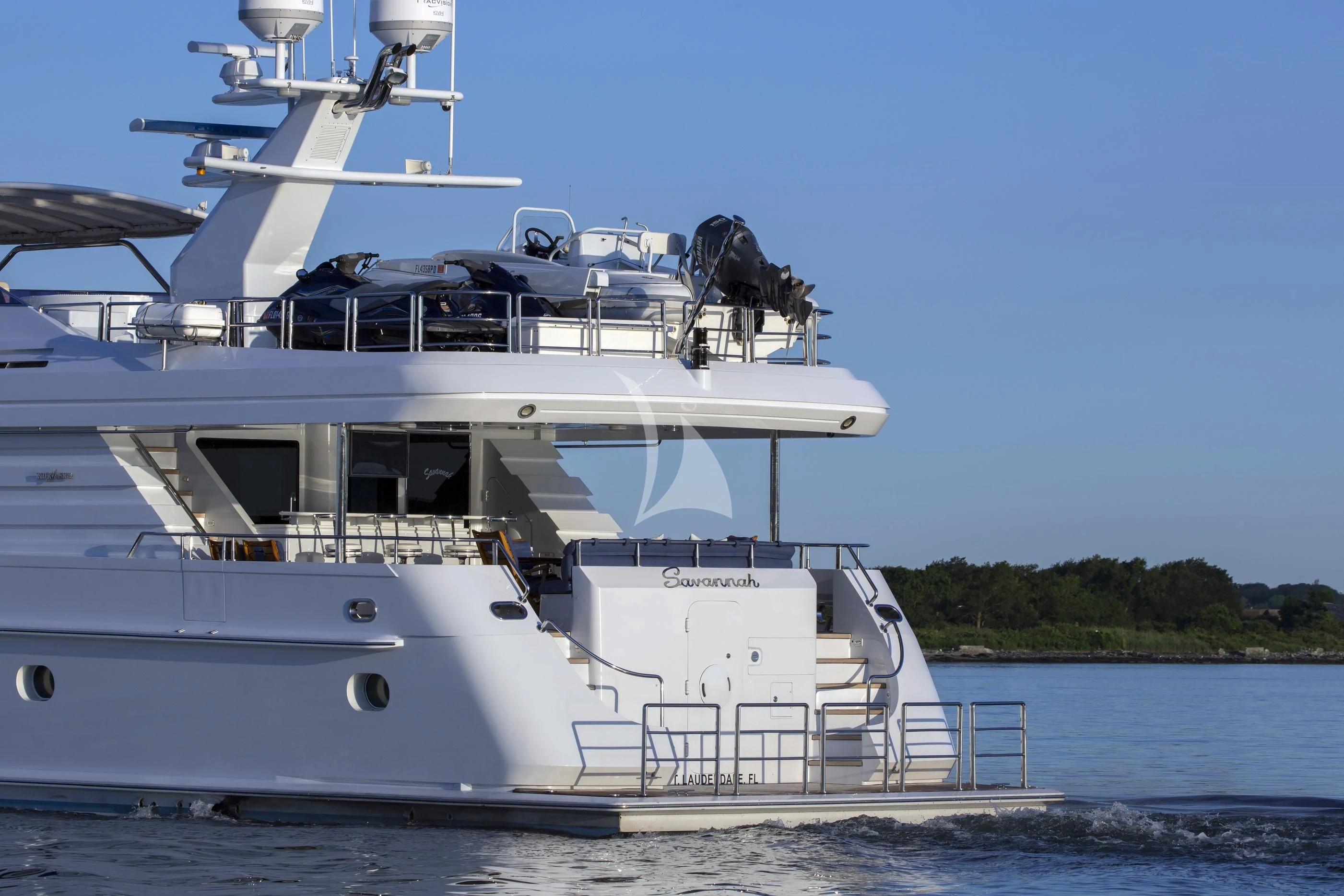 a boat with a motor on the deck aboard XOXO Yacht for Charter