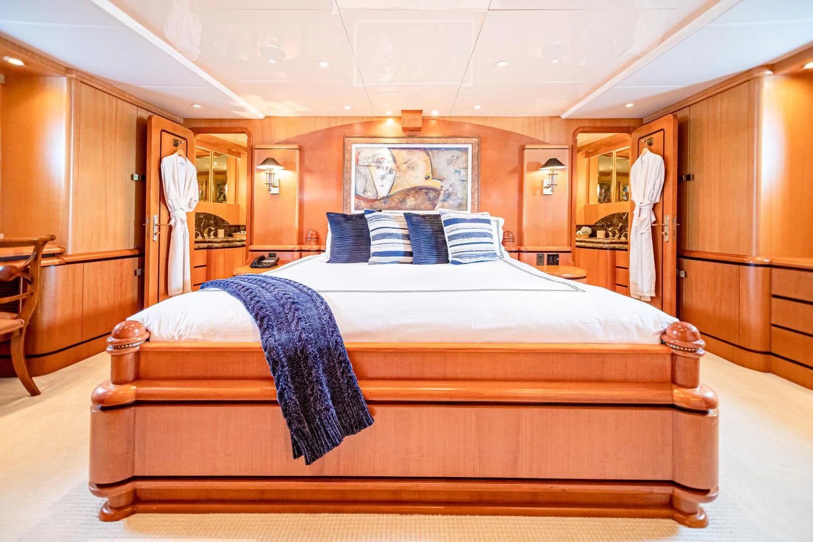 a bed in a room aboard XOXO Yacht for Charter