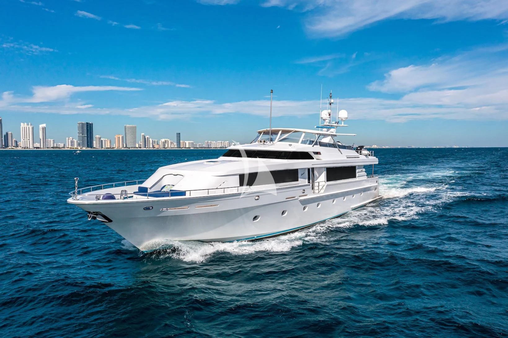 a white yacht on the water aboard XOXO Yacht for Charter