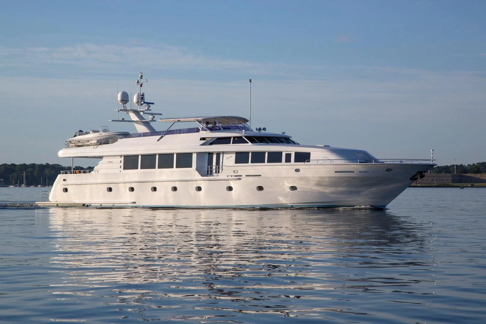 a white boat on the water aboard XOXO Yacht for Charter