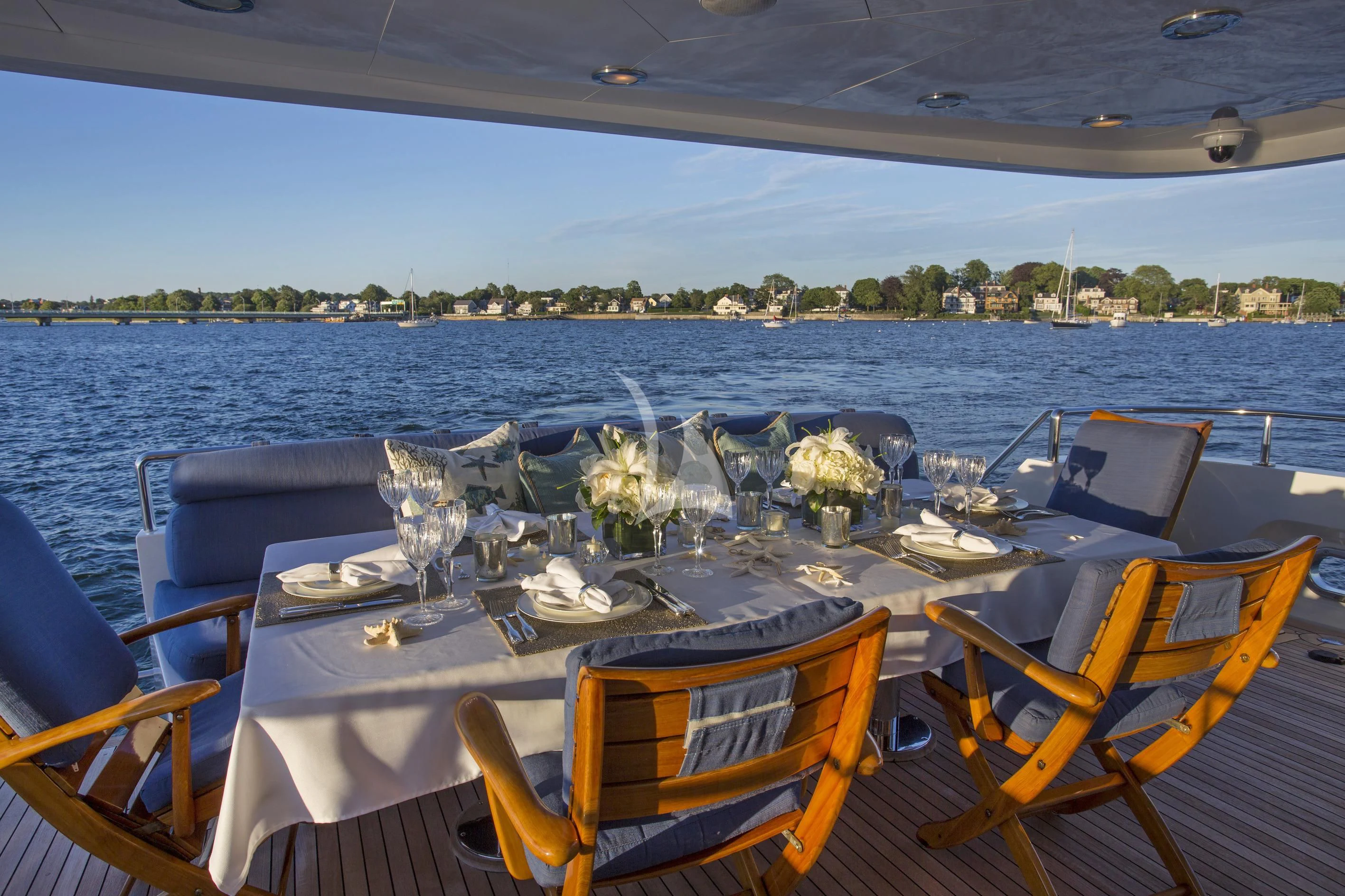 a table set for a wedding aboard XOXO Yacht for Charter