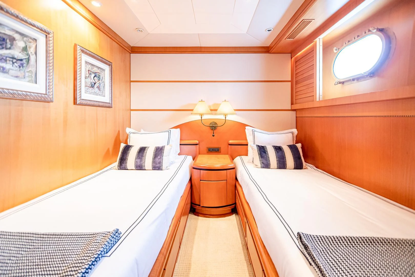 a room with two beds aboard XOXO Yacht for Charter