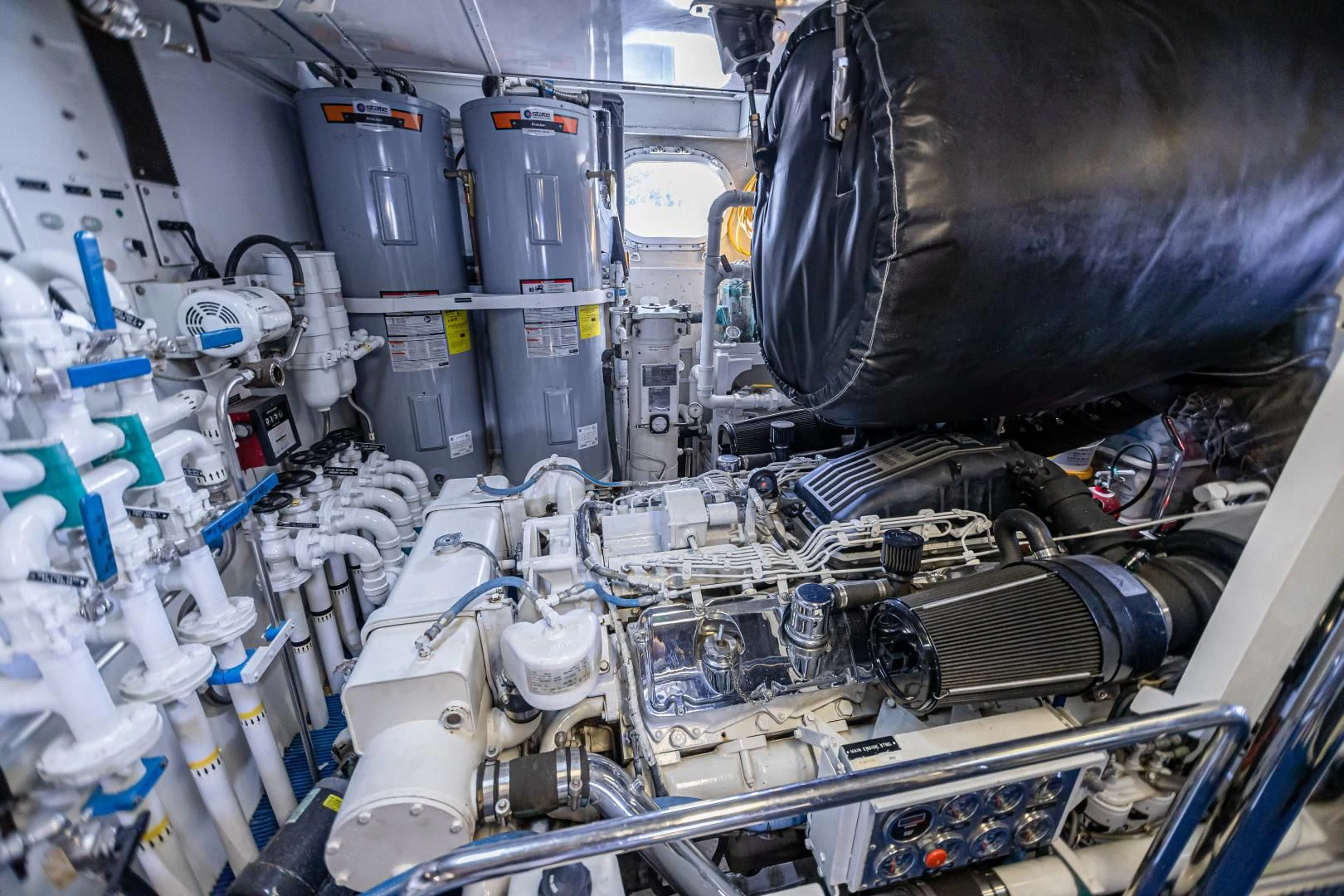 a close-up of a car engine aboard XOXO Yacht for Charter