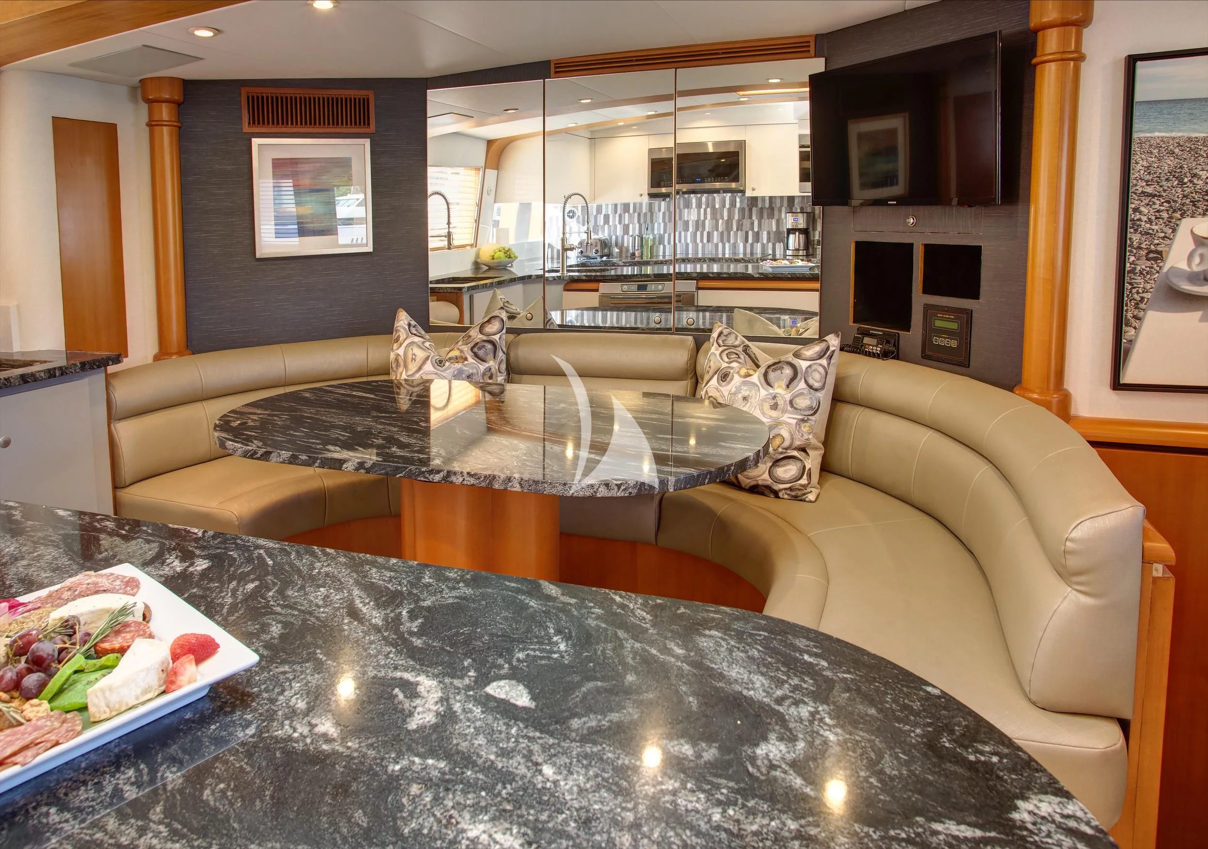 a living room with a couch aboard XOXO Yacht for Charter