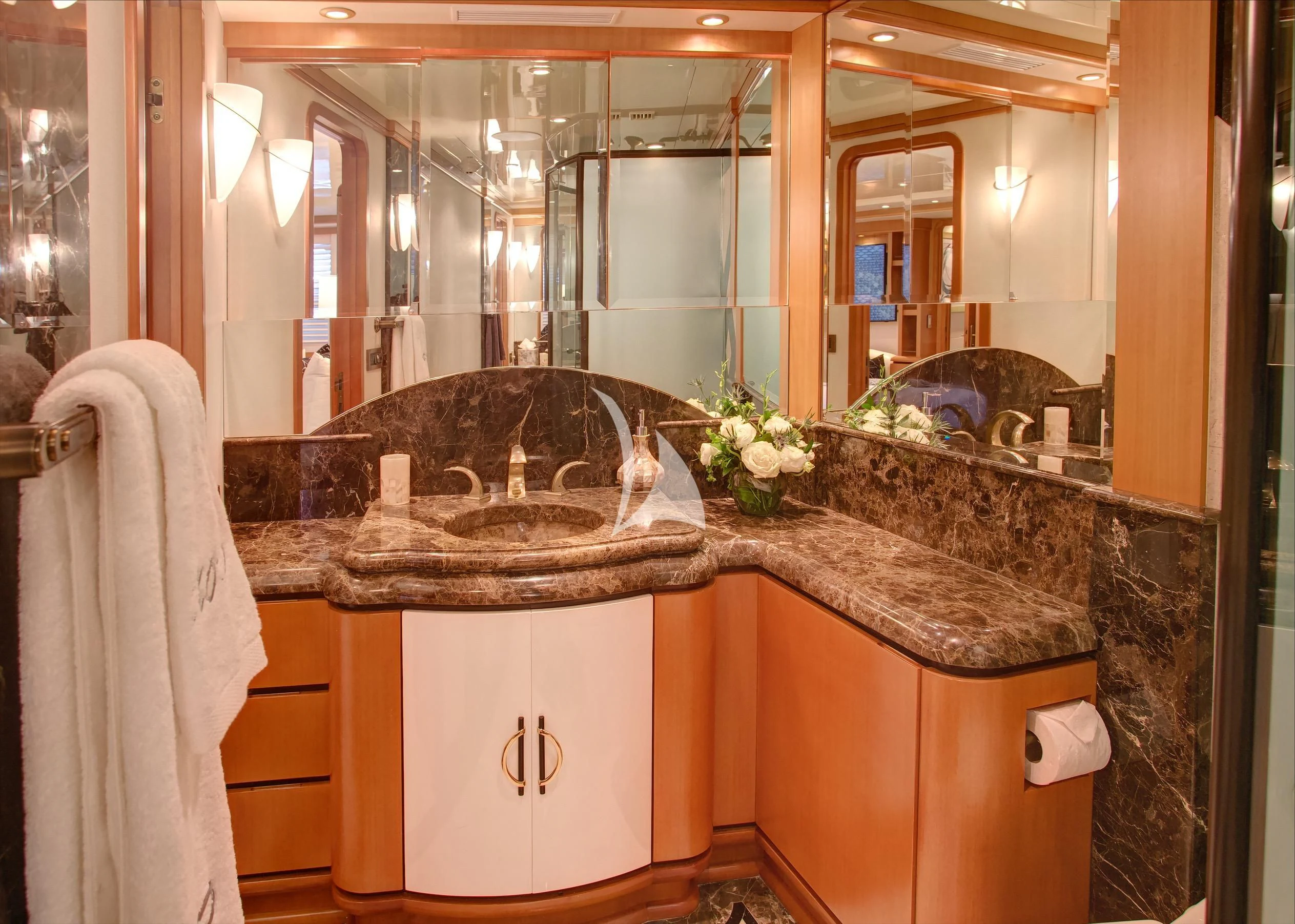 a bathroom with a large sink aboard XOXO Yacht for Charter