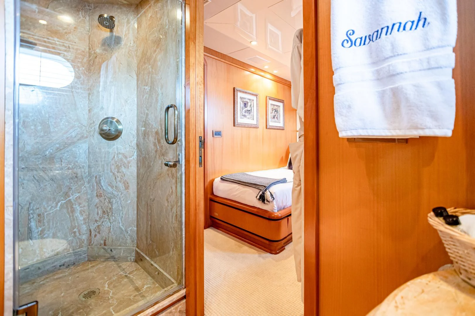 a bathroom with a shower and a sink aboard XOXO Yacht for Charter