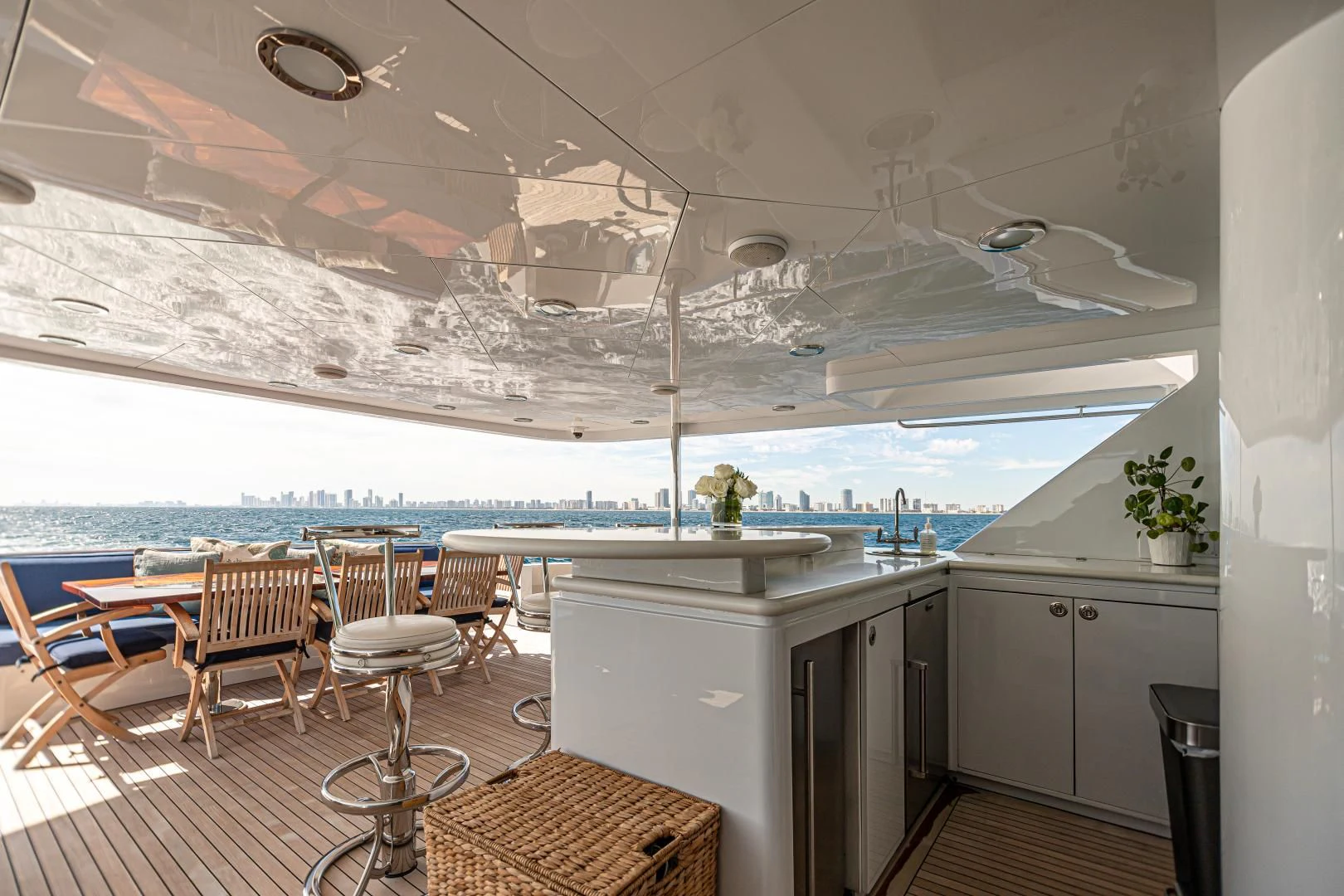 a kitchen with a large island aboard XOXO Yacht for Charter