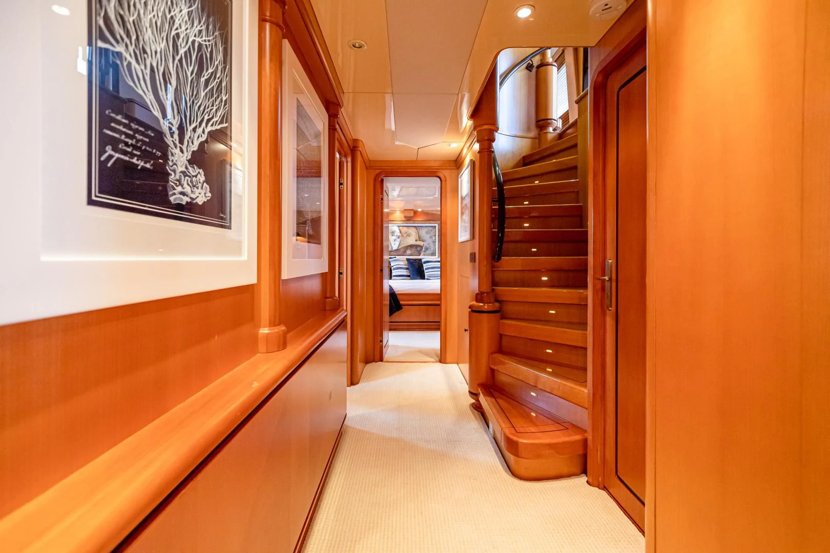 a hallway with wood doors aboard XOXO Yacht for Charter